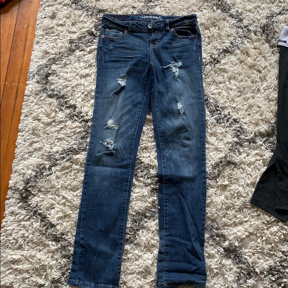 Dark washed jeans with holes